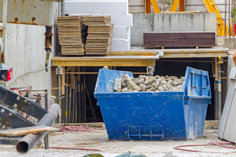 Blue Debris Filled into industrial Skip